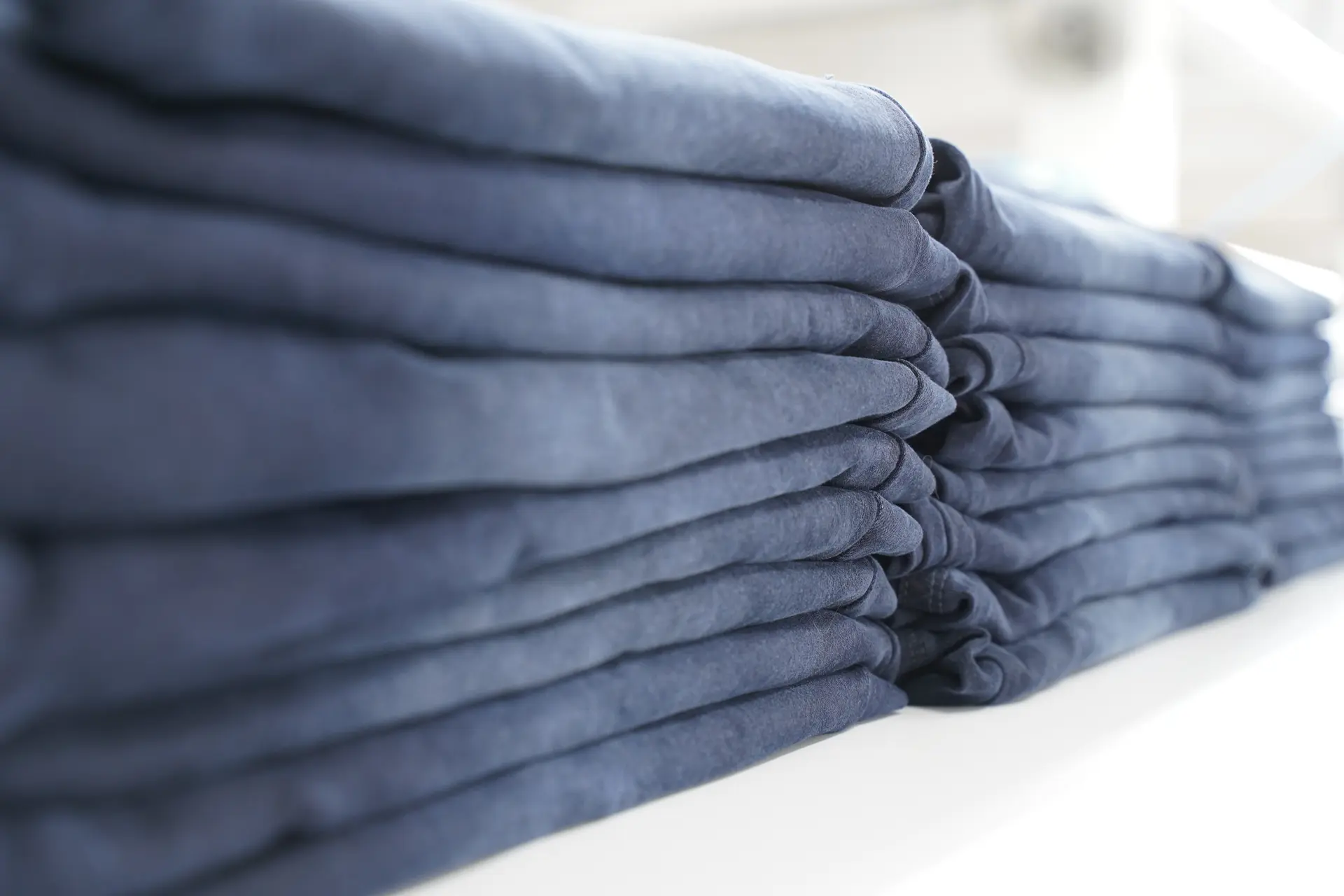 Stacked, finished denim ready for shipment